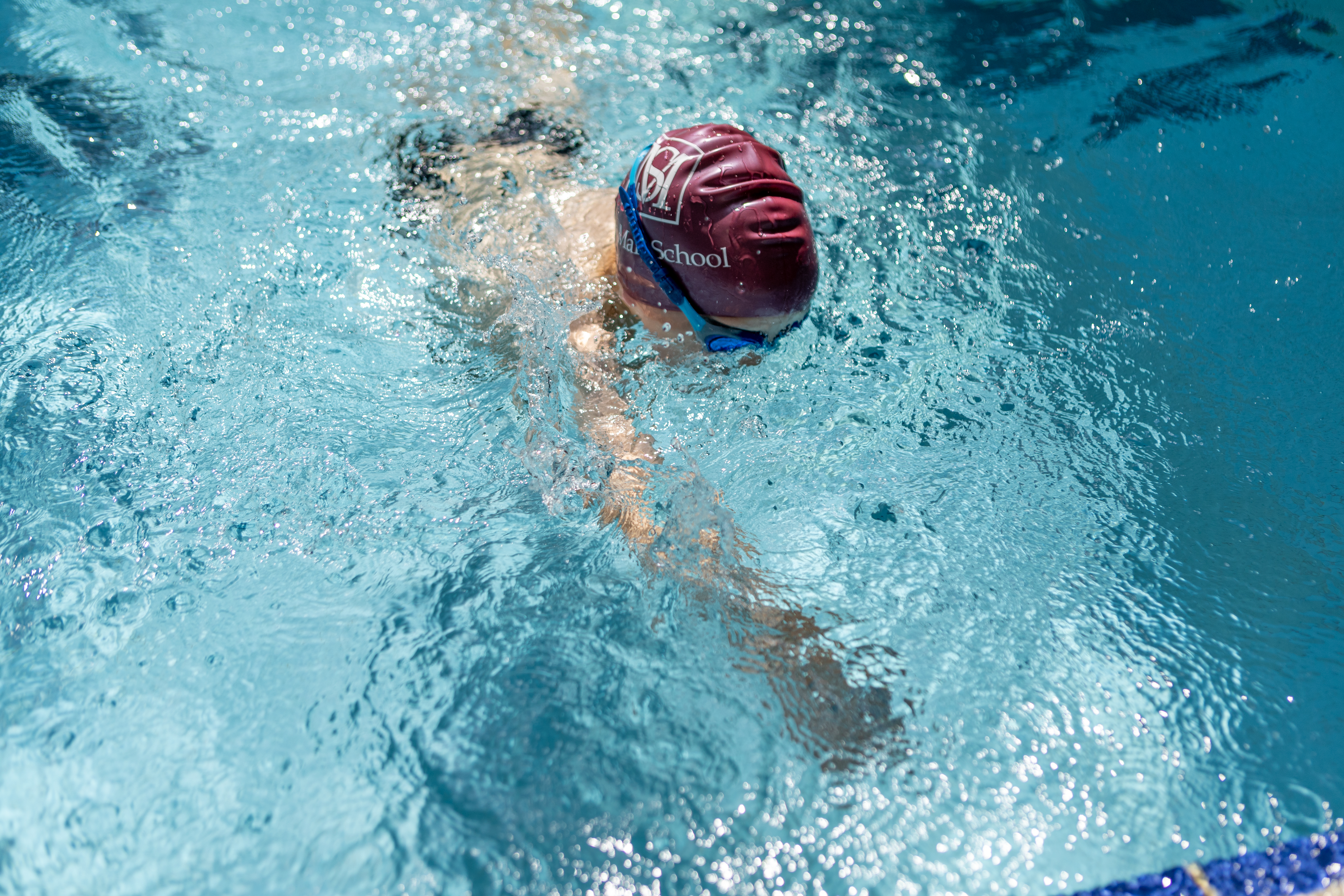 student swimming