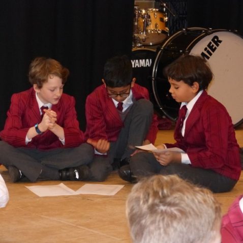 boys reading on the floor