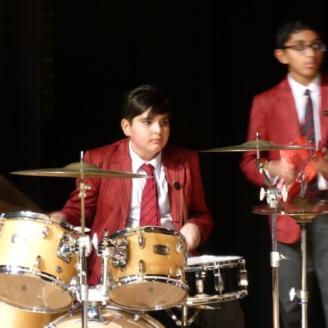 boy playing the drums
