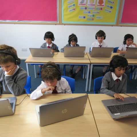 Children getting to work with their laptops