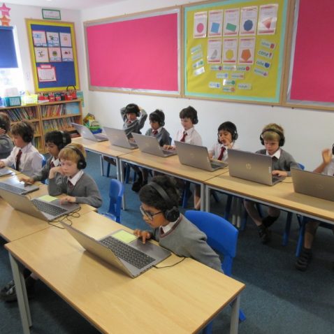 Children getting to work with their laptops