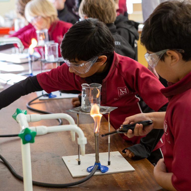 Students using bunsen burners