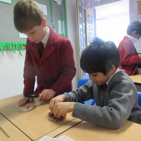 children with petri-dishes