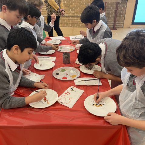 children painting together