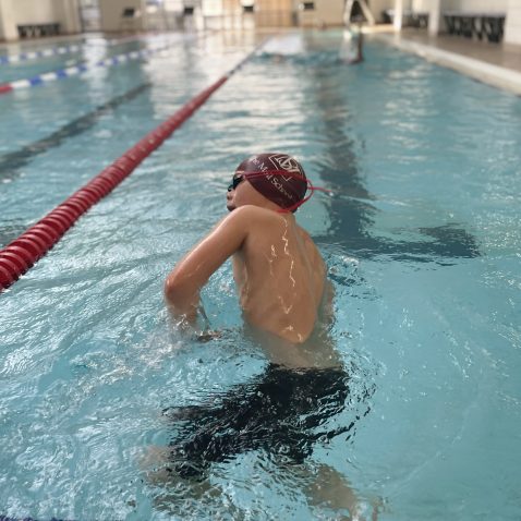 Student about to do a front crawl