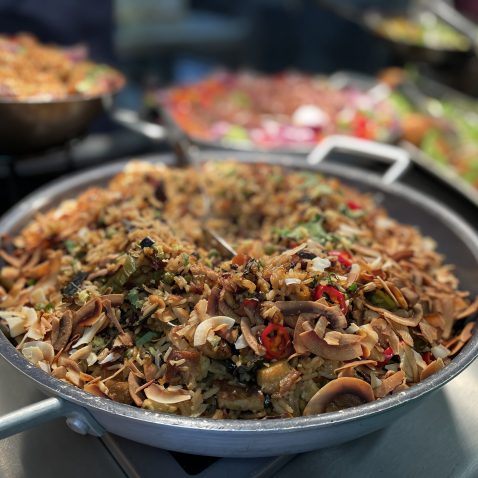 a wok filled with food