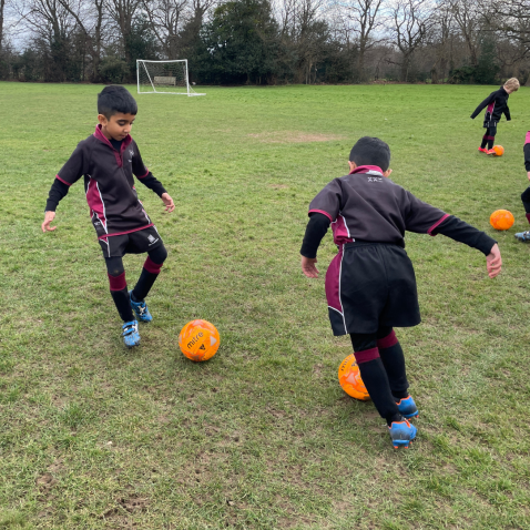students playing football