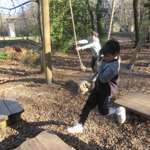 students using obstacle course