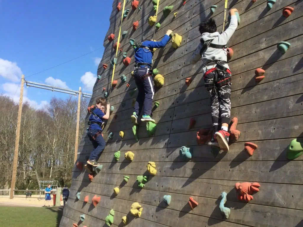 students climbing