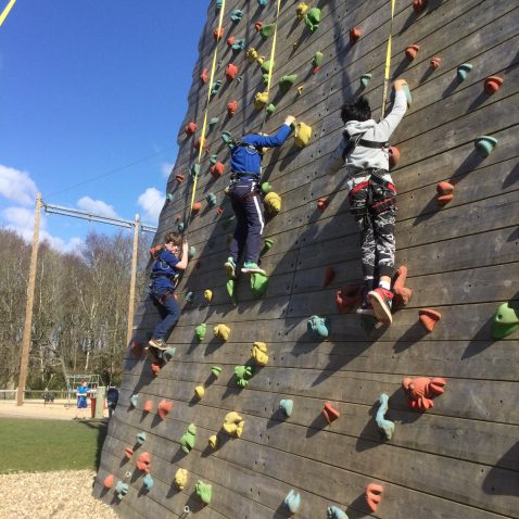 students climbing