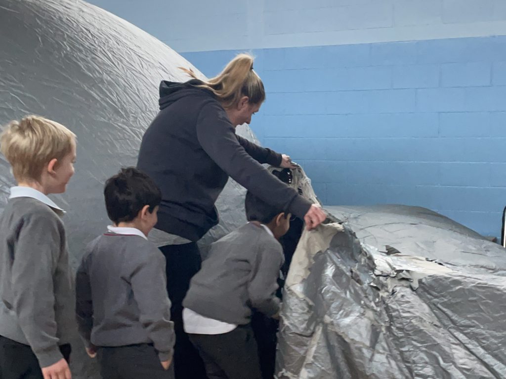 children entering the learning dome