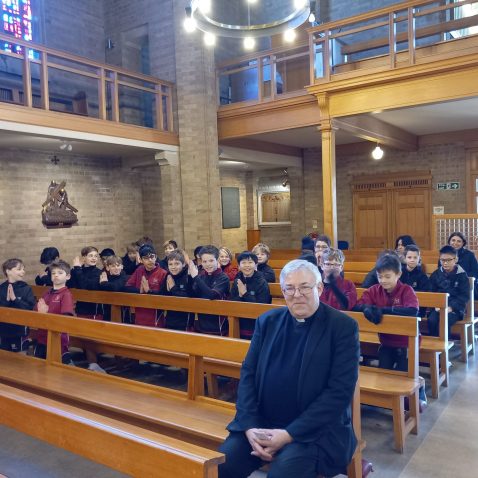 children sat in a church