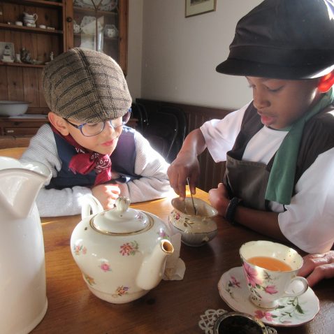 students looking at how to make tea