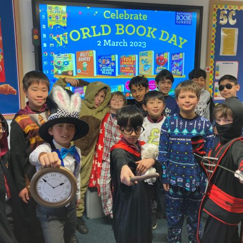 students posing with their outfits on for World Book Day