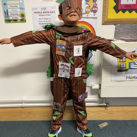 student dressed as a tree