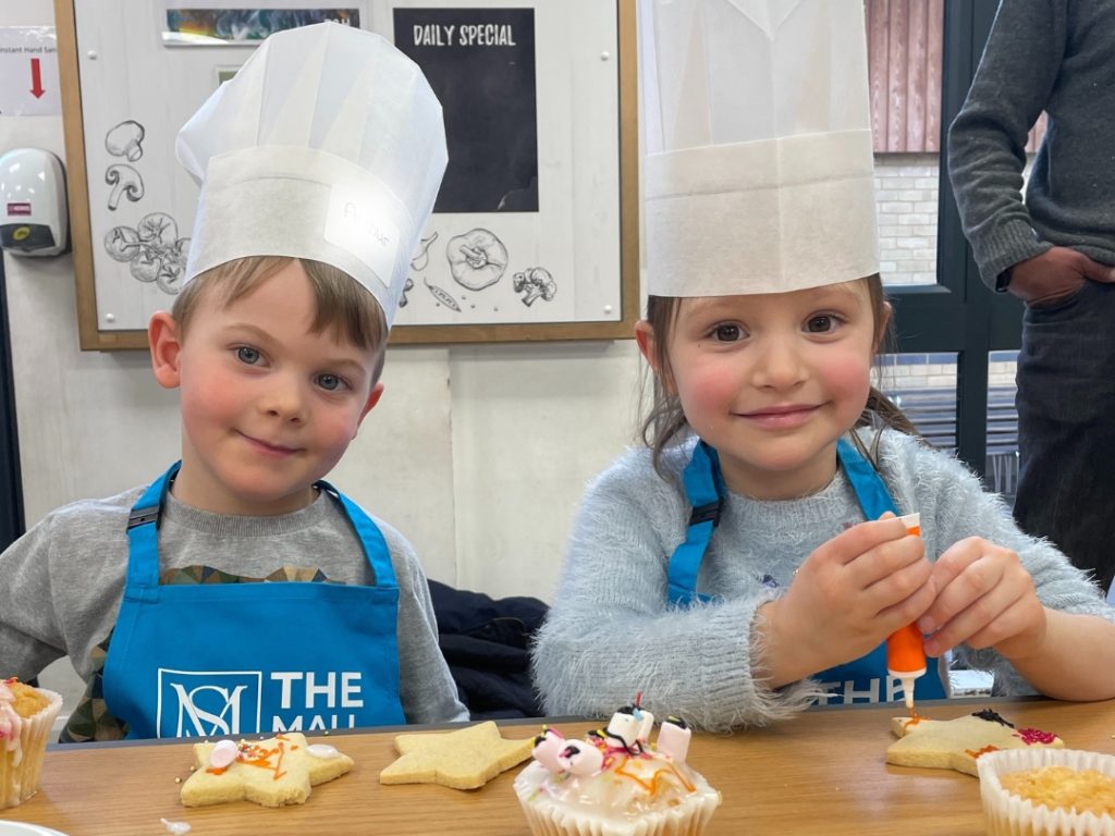 2 students making cakes