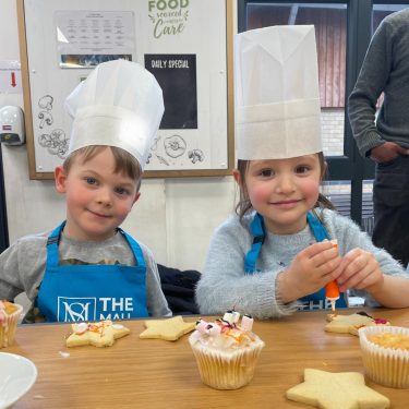 2 students making cakes