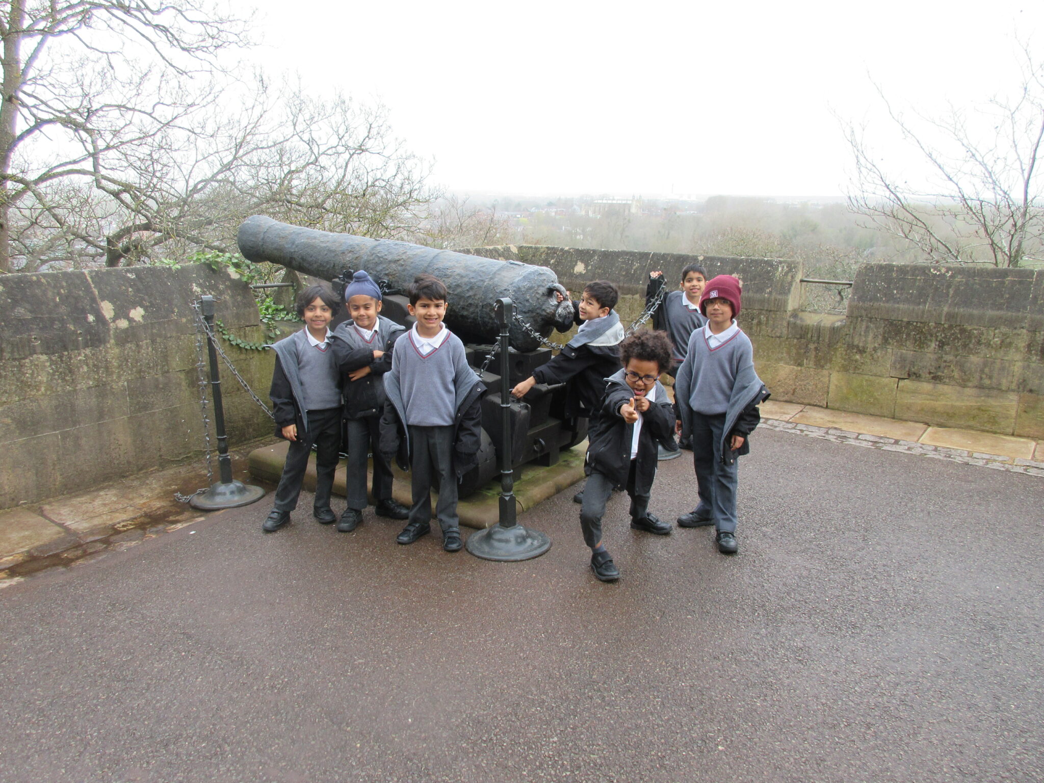 students stood by a canon