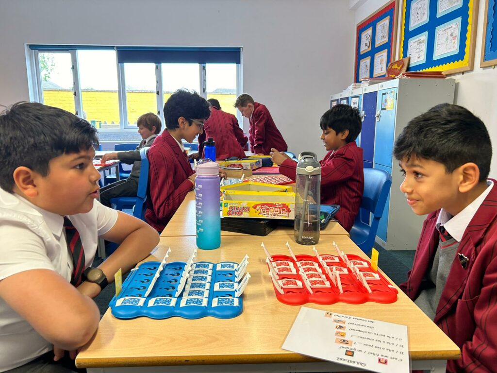students playing board games
